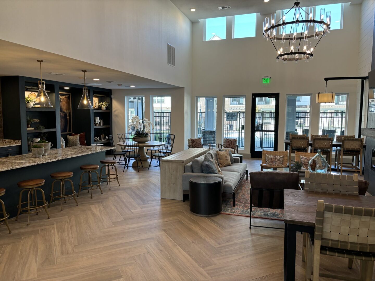 A large open living room with lots of furniture.